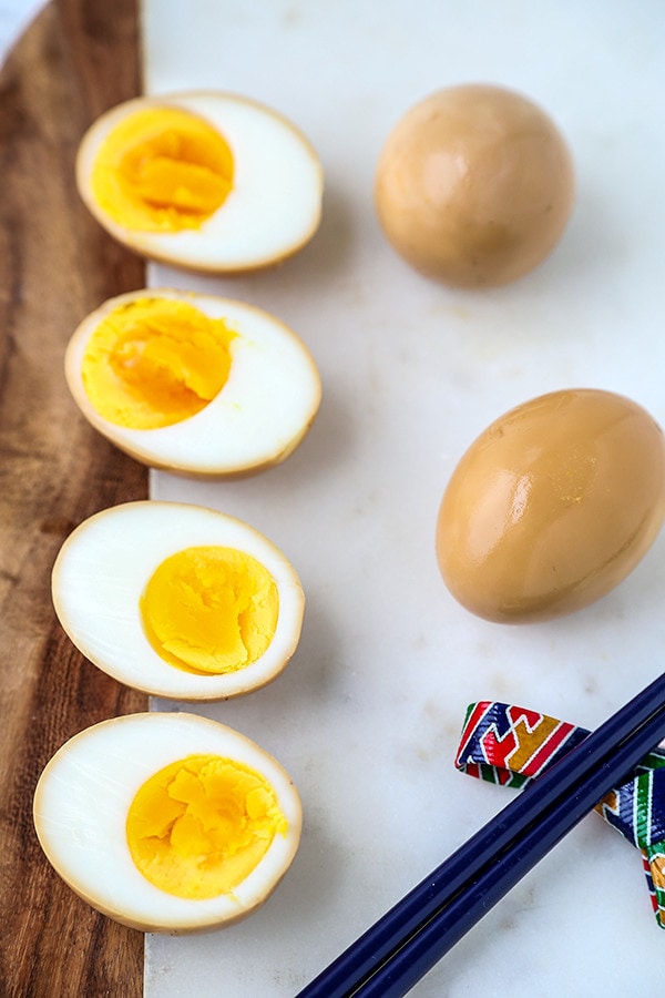 Sliced and whole ramen eggs.
