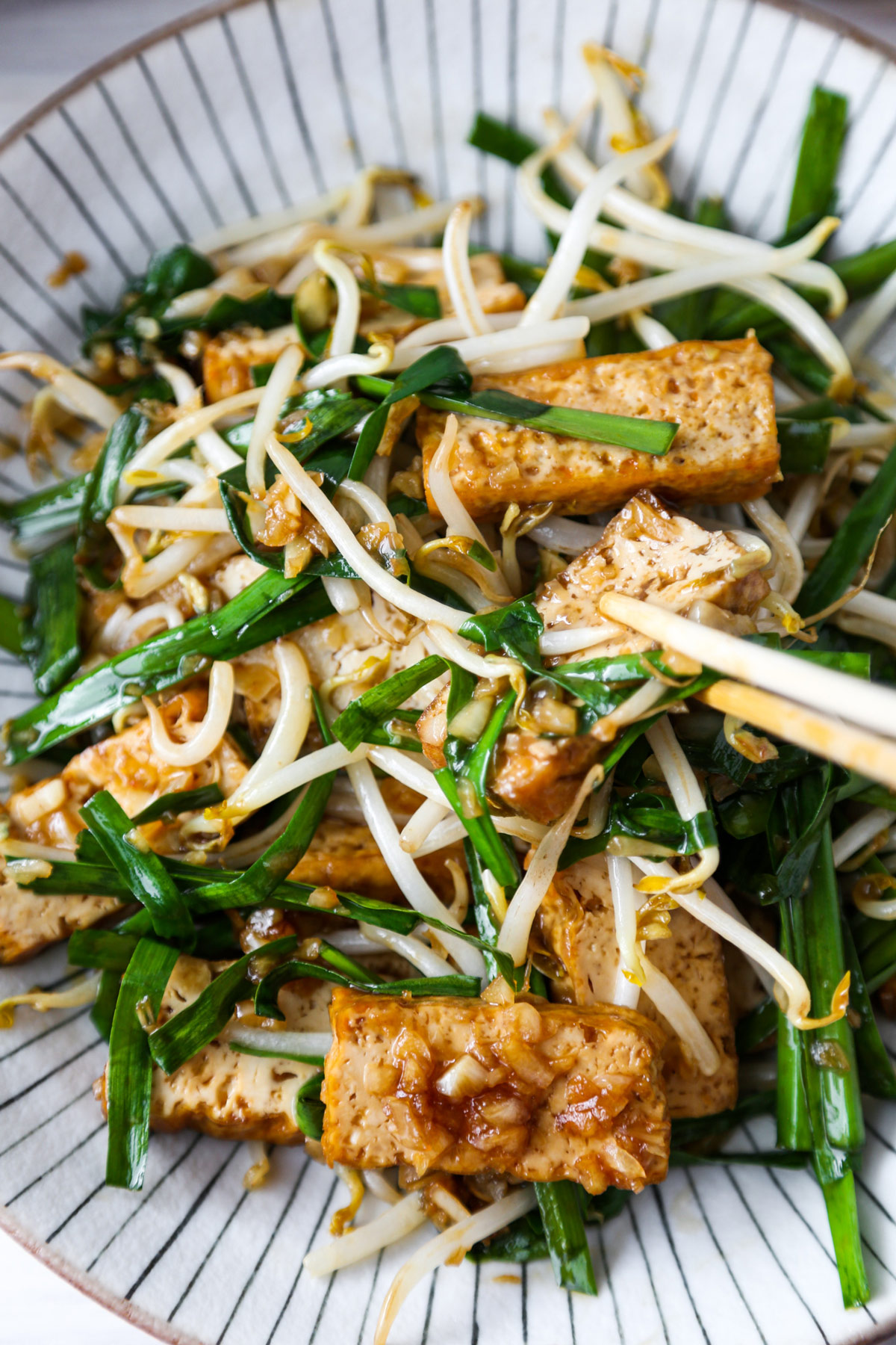 Garlic chives, bean sprouts and tofu stir fry