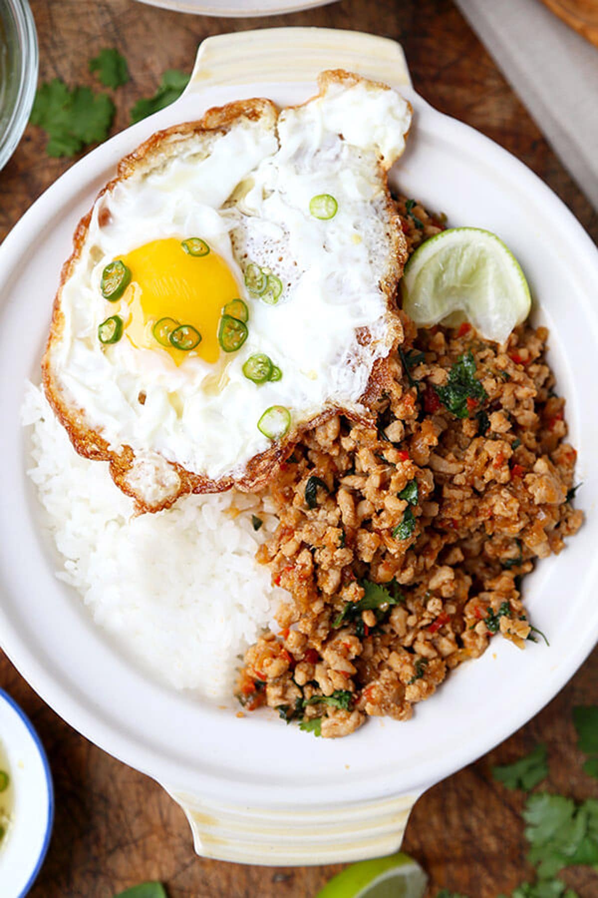 thai basil chicken with rice and a fried egg